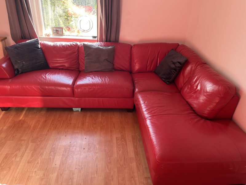 Large red leather corner sofa